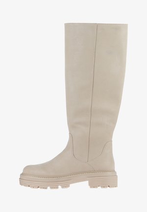 Beige knee-high boot made of smooth leather, featuring a rounded toe and chunky rubber sole with ridged texture. Clean lines and minimal design.