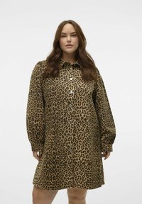 Haljina košulja s leopard uzorkom u smeđoj i crnoj boji, s gumbima sprijeda, dugim napućenim rukavima, opuštenog kroja i meke teksture tkanine.