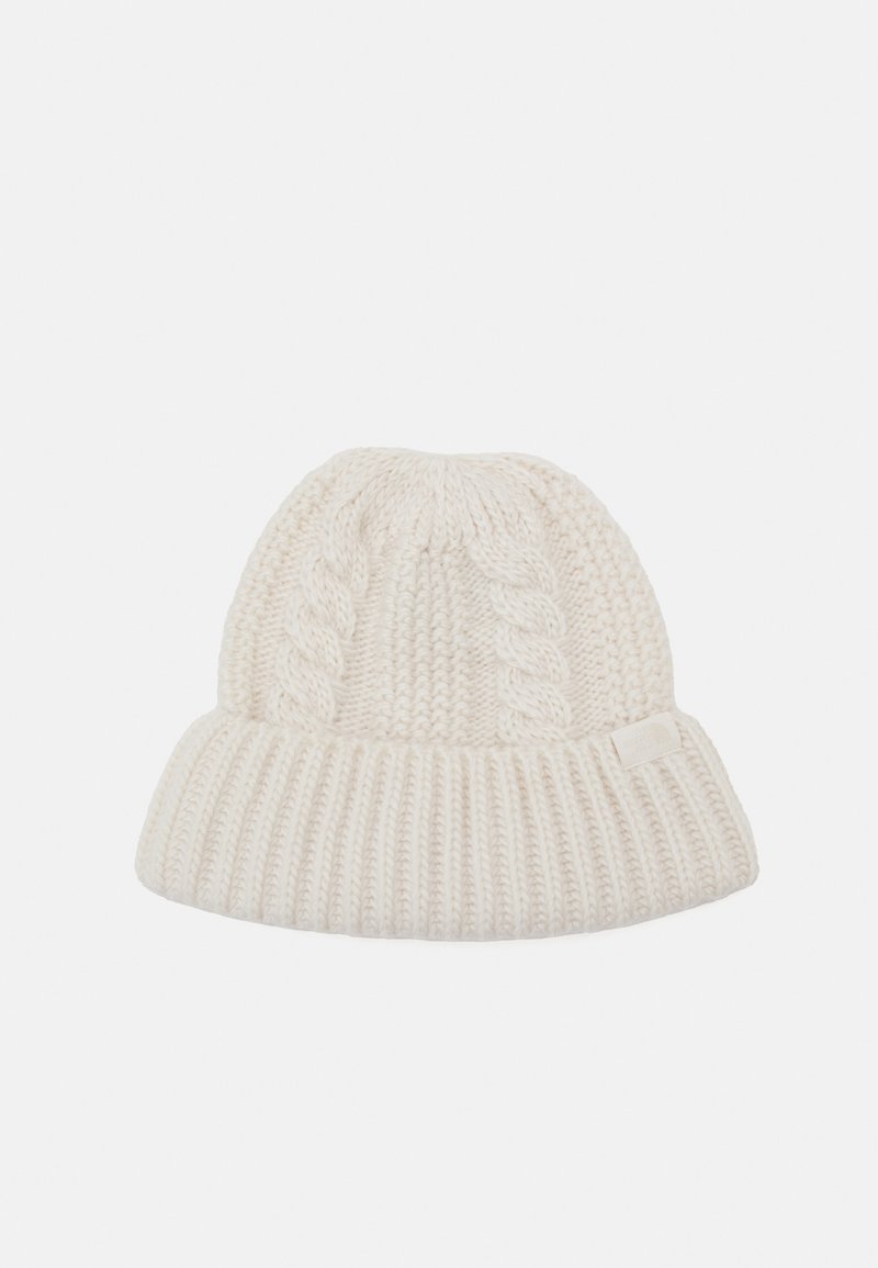 White knitted beanie with a folded brim, featuring ribbed texture and cable knit pattern on the crown. A small label is sewn into the brim.