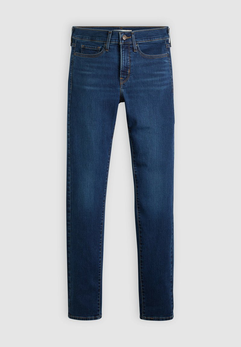 Jeans slim bleu foncé avec bouton et fermeture éclair à l'avant, cinq poches et coutures visibles sur un fond clair.