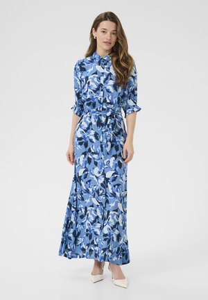 Robe maxi à imprimé floral dans des tons de bleu, avec une fermeture à boutons sur le devant, une taille à nouer et des manches froncées. Texture de tissu lisse.