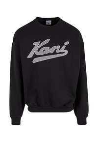 Sort sweatshirt med rund halsudskæring, lange ærmer og ribbede manchetter. Har hvid tekst med mønsteret "Kani" på forsiden. Fremstillet af en bomuldsblanding.