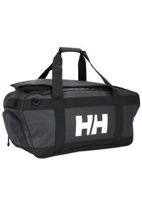 Czarna torba sportowa wykonana z trwałego materiału, z dużą główną komorą, zamknięciem na zamek błyskawiczny i wyraźnym białym logo. Posiada podwójne uchwyty do noszenia dla wygody.