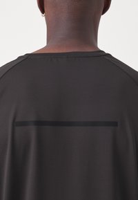 ICANIWILL STRIDE RAGLAN - Sportfelső - charcoal