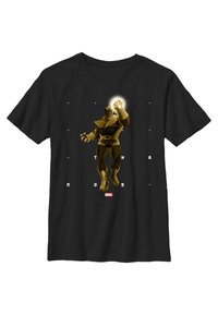 Svart t-shirt med en stor grafik av en gyllene karaktär med en upphöjd hand. Texten "THANOS" i vita bokstäver nedanför.