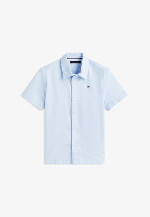 Light blue short-sleeve button-up shirt with collar and small Tommy Hilfiger logo on left chest.