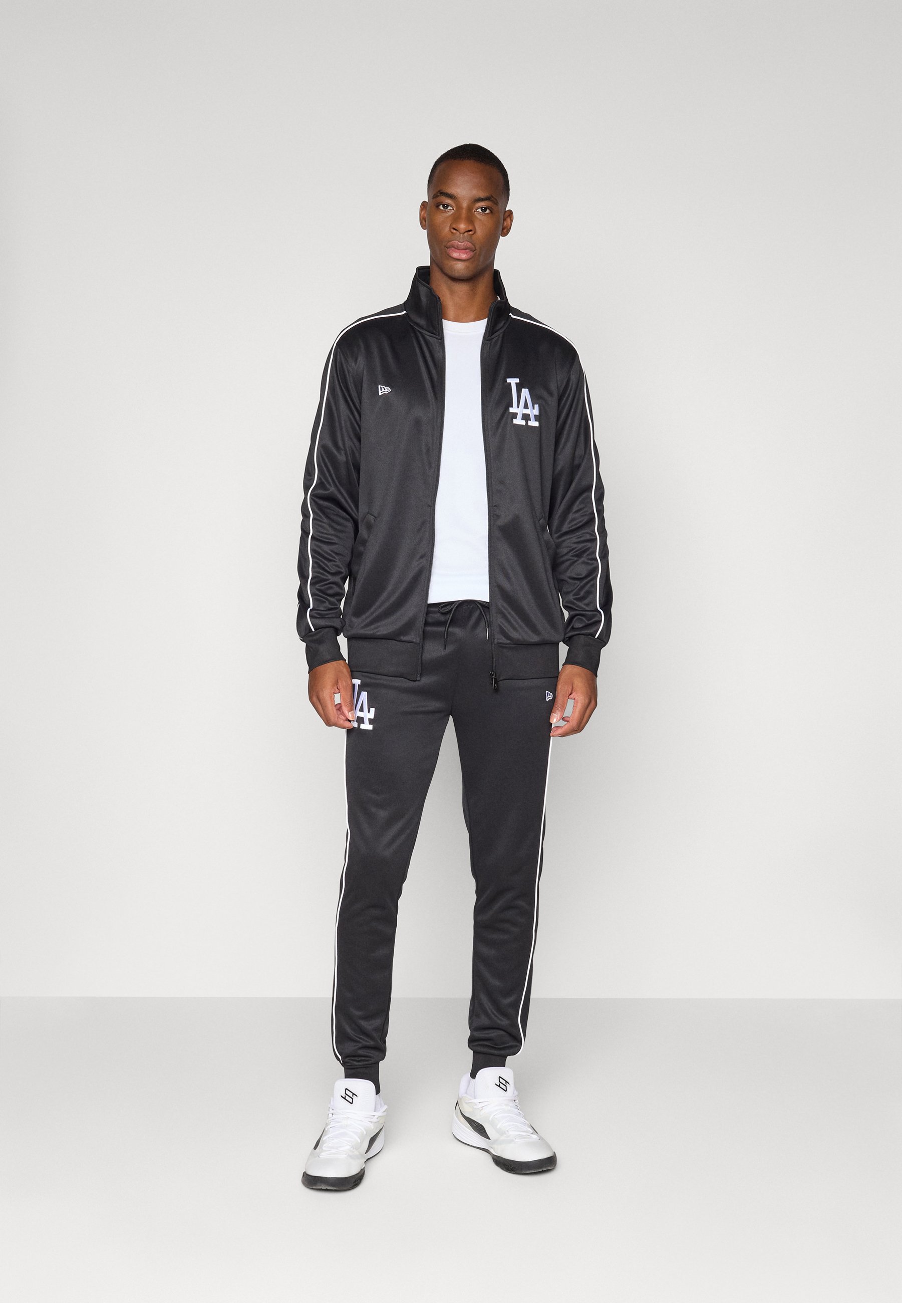 Los Angeles Dodgers アメリカンフットボールジャージ Los Angeles Dodgers Black Half Zip Starter Jacket | Pro Image Sports