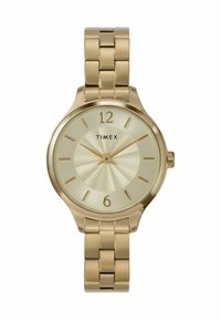Guldtonet Timex ur har en rund kasse, tekstureret cremefarvet urskive med bølgemønster og en matchende metalarmbånd. Tal på 12 og 6.