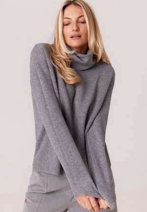 - Sweter