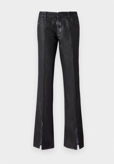Black flared trousers with a glossy finish, featuring two front pockets and slits near the hem, made from durable fabric.