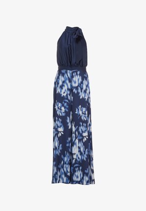 Tuta navy con scollo all'americana, caratterizzata da un dettaglio con fiocco e un design a gamba larga decorato con un motivo floreale blu e bianco.