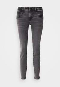 Jean slim fit gris en denim avec cinq poches et ourlets effilochés, présenté sur un fond blanc uni.