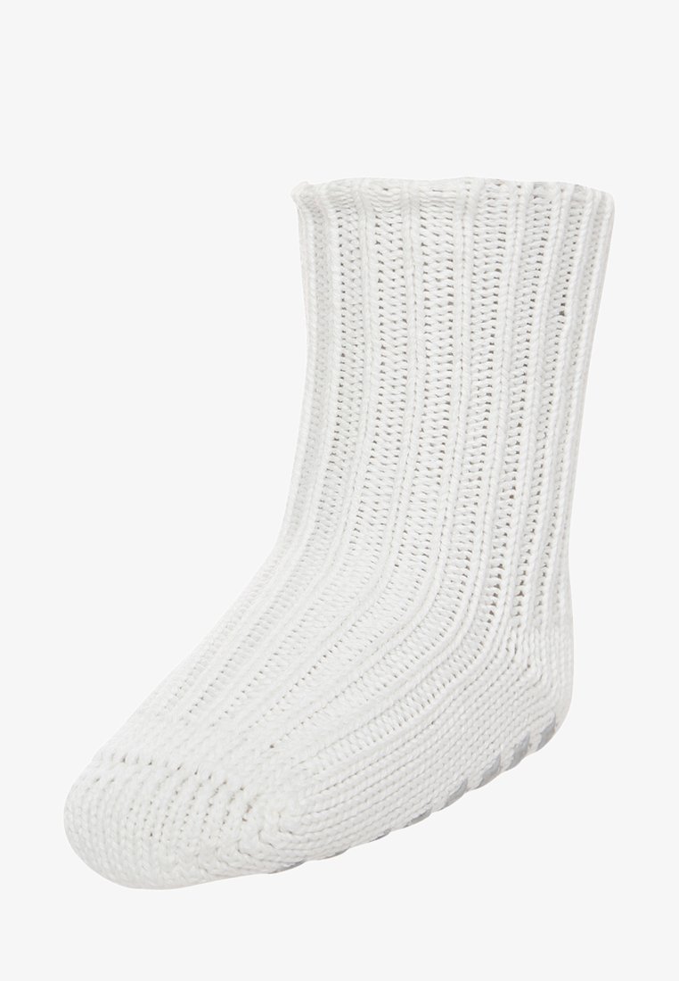 White knitted sock with ribbed texture, rounded toe, and elasticated top. Features a solid color with no visible patterns or accents.