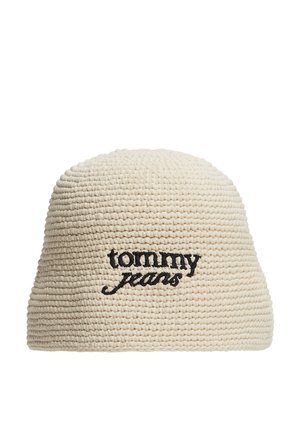 Beige gebreide bucket hat met zwart geborduurd "tommy jeans" logo in het midden aan de voorkant.