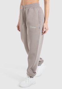 Smilodox Teplákové kalhoty - hellbraun