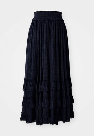 Dark navy maxi skirt made of lightweight fabric with a smocked waistband and tiered ruffles at the hem, featuring a subtle check pattern.