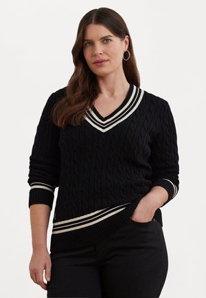 Black cable-knit sweater with a V-neck and white striped accents on the collar and cuffs. It features long sleeves and a relaxed fit.