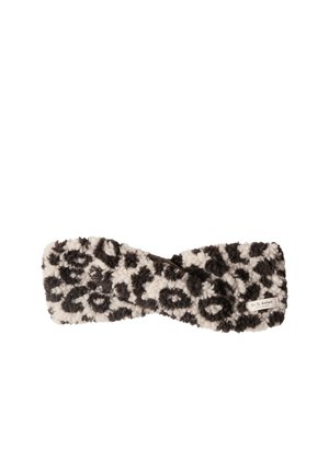 Bandeau tricoté avec motif léopard noir et blanc et petite étiquette cousue sur un côté.
