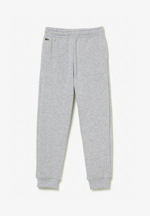 Pantaloni della tuta grigi realizzati in tessuto morbido, con vita e polsini elasticizzati, e un piccolo logo verde sulla parte superiore della gamba sinistra.