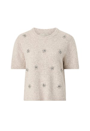 Kortærmet, lysebeige sweater lavet af blødt materiale, med sølvfarvede blomsterudsmykninger jævnt fordelt over fronten.
