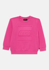Rosa Sweatshirt mit einem strukturierten LEGO-Logo in der Mitte, rundem Ausschnitt, langen Ärmeln und gerippten Bündchen und Saum. Weiche Stofftextur.