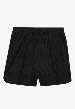 Pantaloni scurți negri cu o suprafață texturată și ibridă, un tiv elastic cu șnur și buzunare laterale.