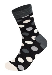 Chaussettes noires avec des motifs ovales multicolores dans des teintes de gris et de blanc. Poignet côtelé et talon gris uni. Texture lisse.