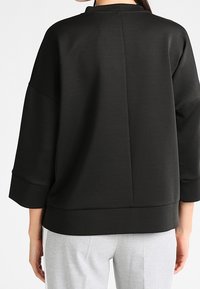 OPUS Sudadera - black