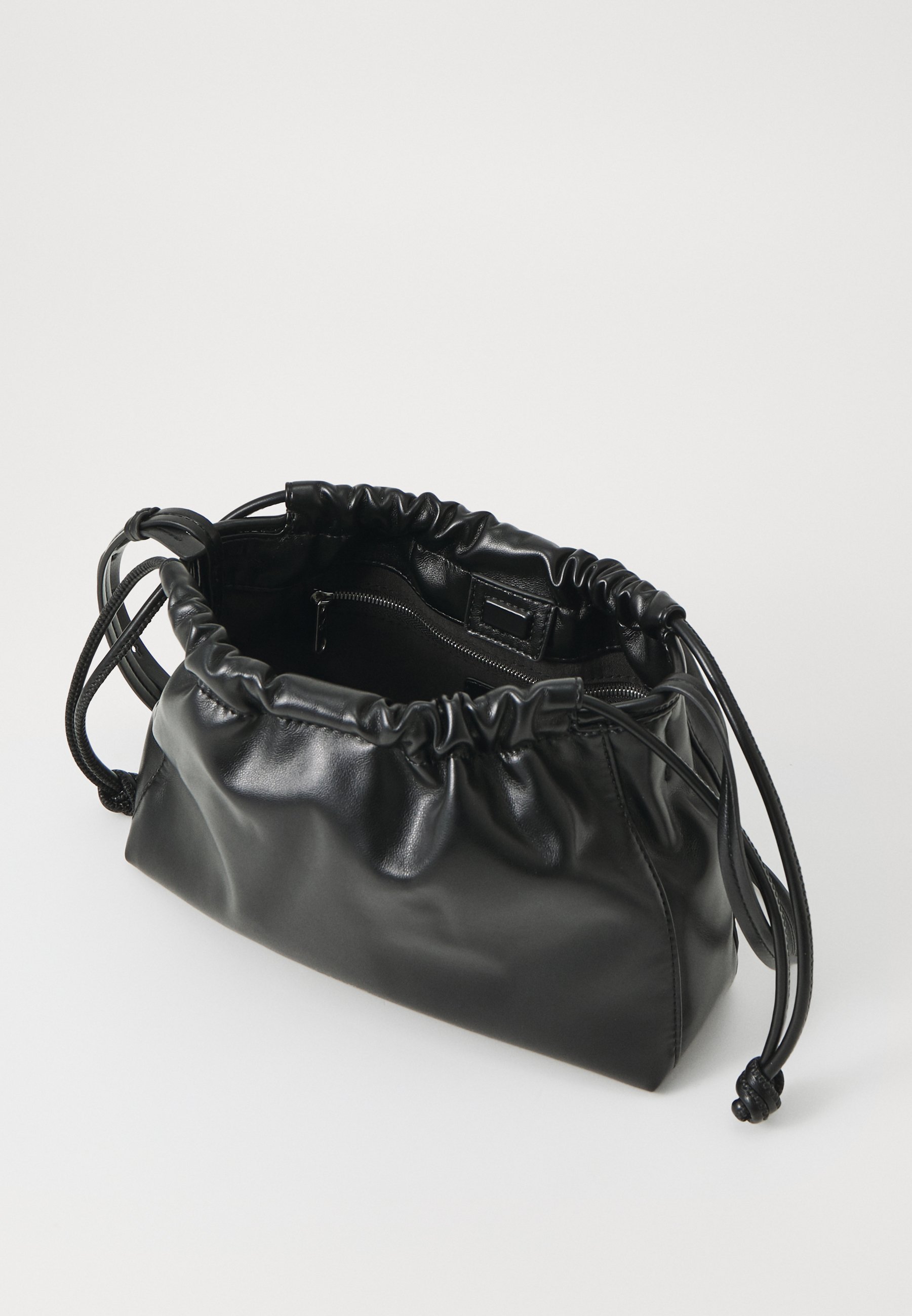 Calvin Klein Jeans DRAWSTRING BAG - Cross body bag - black