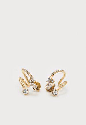 Gold-tone earrings with a spiral design, featuring multiple clear gemstones and a round crystal accent at the base.