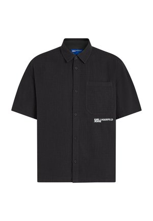 Must must lühikeste varrukatega nööbitav särk kraega, vasakul küljel rinnatasku ja valge "KARL LAGERFELD JEANS" logo tasku lähedal.