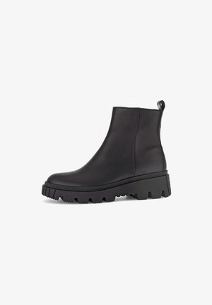 Black ankle boots made of smooth leather with a chunky, textured sole and a pull-tab at the back for easy wear.