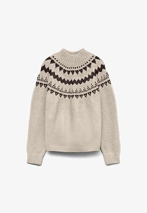 Bež pleteni pulover z visokim rebrastim ovratnikom in črnim geometričnim nordijskim vzorcem okoli ramen in prsnega dela.