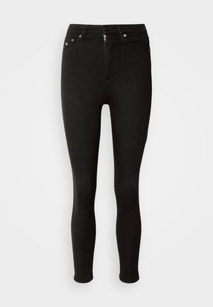 Melni šaurie džinsi, kas izgatavoti no denima, ar pogu un rāvējslēdzēju, piecām kabatām un gludu, teksturētu virsmu.