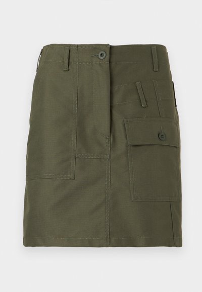 Olive green skirt featuring a button closure, two front pockets, and additional patch pocket; made from durable fabric with textured finish.