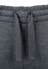 Graue Jogginghosen aus einem weichen Stoff, mit einem elastischen Bund und verstellbaren Schnürsenkeln sowie einem einheitlichen, glatten Design.