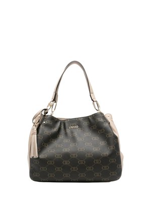 Sac Liu Jo noir et beige avec un motif monogramme, logo doré, double poignées, détail en pompon et quincaillerie dorée sur fond blanc.