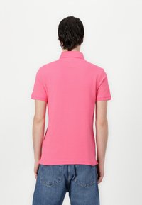 Tommy Hilfiger SLIM - Polo shirt - pink alert