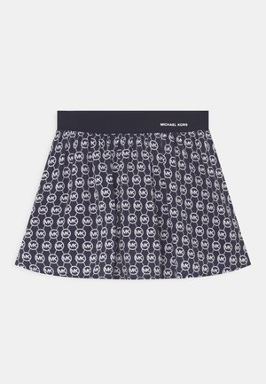 Marineblå boxershorts med gentaget hvidt MK-logo mønster og ensfarvet linning med Michael Kors-brandnavn i hvid.
