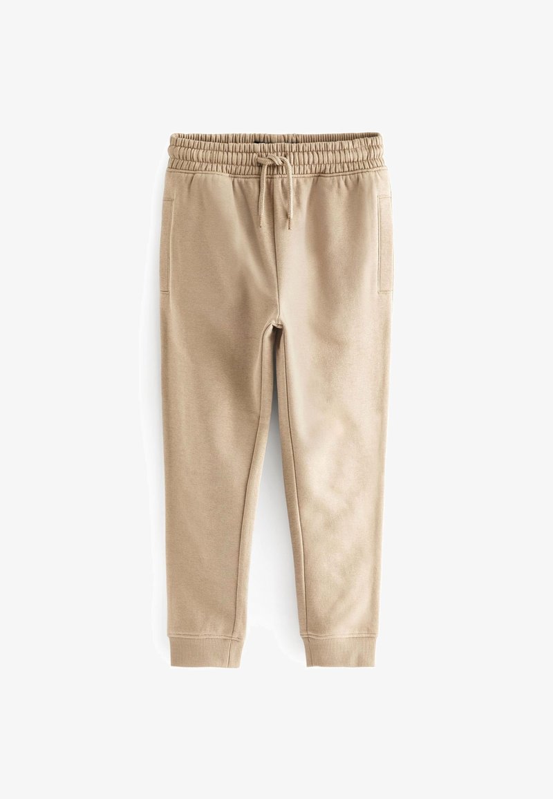 Pantaloni jogger in tessuto morbido beige con vita elastica, coulisse, tasche laterali e polsini a costine alle caviglie.