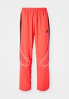 TEAMGEIST  - Tracksuit bottoms - lucid red/black