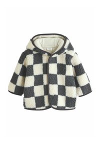 Fleece takki, jossa on huppu ja musta-valkoinen ruutukuvio. Ominaisuuksiin kuuluu pehmeä pinta, pyöristetyt reunat ja erottuva tumma päällyste aukkojen ympärillä.