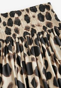 GLOSSY PRINTED - Klostuotas sijonas - gold