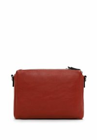 Red leather rectangular clutch bag featuring a zip closure and a detachable strap. Smooth texture with minimalistic design accents.