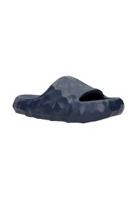 Navy blue slide sandal featuring a textured, honeycomb pattern and an open toe design. Made from molded rubber material, lightweight.