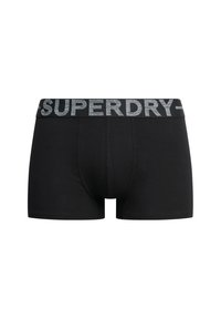 Boxers noirs ajustés, fabriqués en coton. Dotés d'une ceinture élastique grise avec le texte "SUPERDRY". Texture lisse.