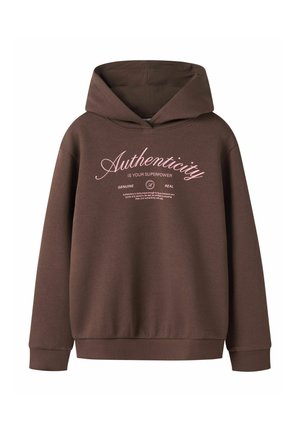 Sweat à capuche marron à manches longues avec texte rose indiquant "Authenticity is your superpower" au centre devant.