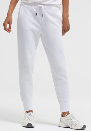 SENSES.THE LABEL, SENSES.THE LABEL SWEATPANTS PAT:RESI AUS INTERLOCK - Tracksuit bottoms - opticwhite