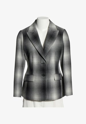 Blazer a quadri grigio e nero con rever a lancia, due tasche frontali con patta e chiusura con un solo bottone su un torso di manichino bianco.