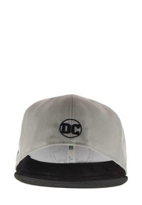 Gray cap with a black flat brim and underside, featuring an embroidered circular logo with "DC" on the front. Smooth fabric texture.